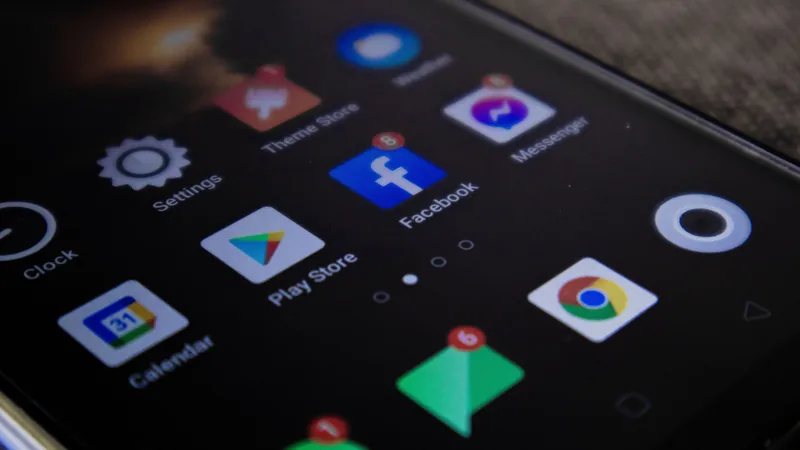 A smartphone screen shows multiple connected app icons, representing no-code app integration and workflow automation.